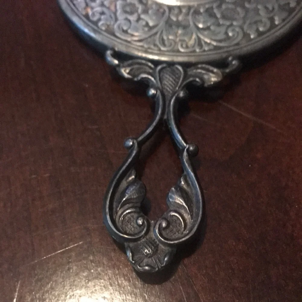 Antique silver small mirror and comb set